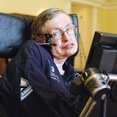 Prof. Stephen Hawking  posługuje się skomplikowanym urządzeniem, poruszanym  jednym palcem