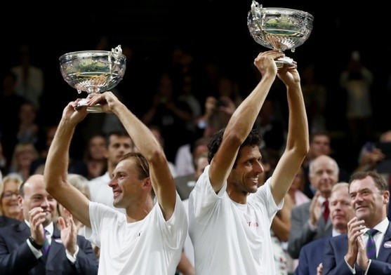 Łukasz Kubot wygrywa Wimbledon