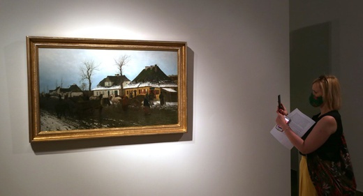 Obraz Maksymiliana Gierymskiego "Zima w małym miasteczku" po konserwacji