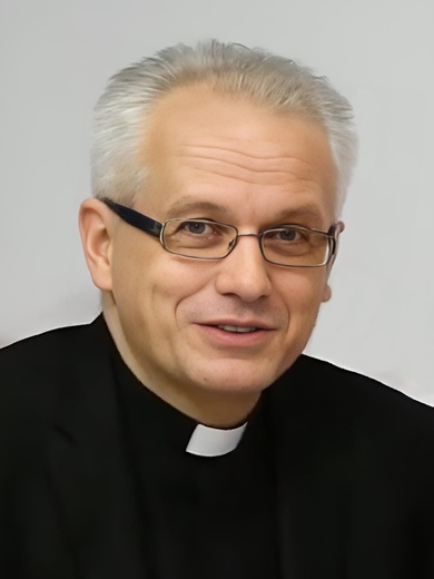 Ks. Piotr Rożek.