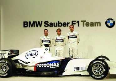 Od lewej: Kanadyjczyk Jacques Villeneuve, Niemiec Nick Heidfield i Robert Kubica 