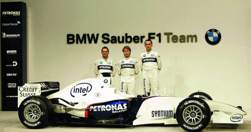 Od lewej: Kanadyjczyk Jacques Villeneuve, Niemiec Nick Heidfield i Robert Kubica 