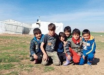 ▲	Jazydzkie dzieci uchodźców w północnym Iraku.