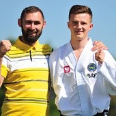 Mistrz Europy w taekwondo ITF z trenerem Piotrem Członką.