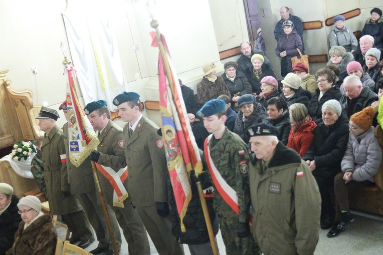 Tablica ks. Stanisława Fiołka