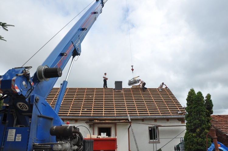 Odbudowa domów w Landzmierzu