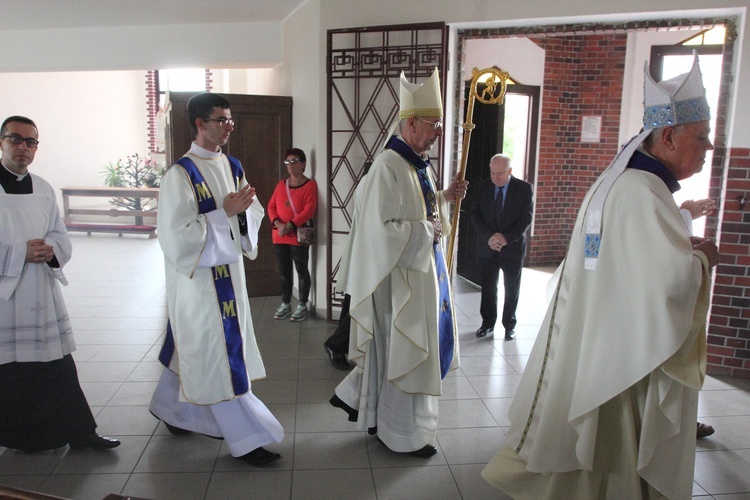 Bibliści przy ołtarzu