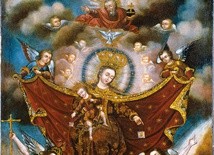 Matka Boża z małym Jezusem nakazują aniołom wyprowadzanie dusz z czyśćca. Chrystus i Jego Matka trzymają w rękach szkaplerze. To znak, że szkaplerz jest drogą do zbawienia. Anioły podtrzymują opiekuńczy płaszcz Maryi, a u góry widzimy Boga Ojca i Ducha Świętego.