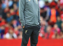 Jürgen Klopp, Niemiec, trener Liverpoolu.