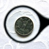 Moneta chińska – 1 juan – znaleziona podczas przeliczania ofiary w św. Wojciechu.