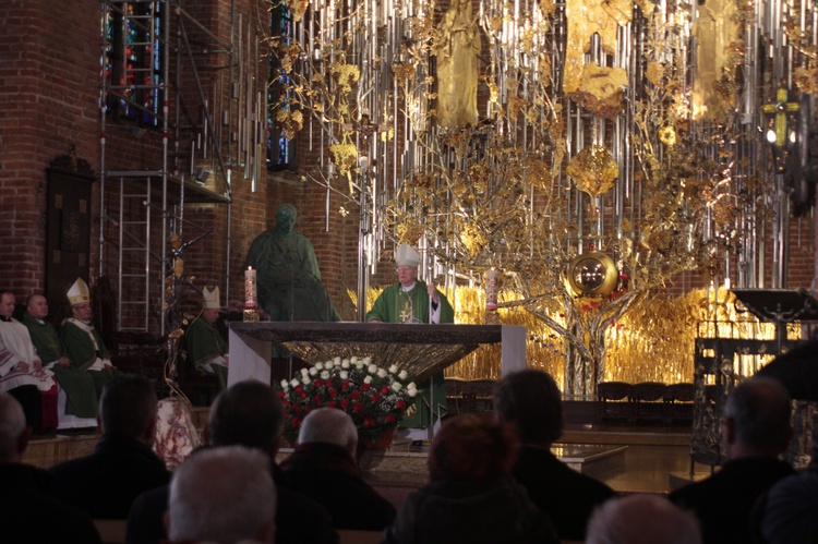 Abp Marek Jędraszewski w bazylice św. Brygidy