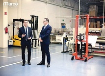 ▲	Szef rządu z prezesem przedsiębiorstwa Markiem Ślibodą.