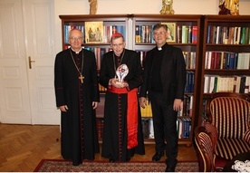 Od lewej: abp Stanisław Budzik, kard. Kurt Koch i ks. Robert Biel.