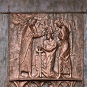 Biskup Jordan chrzci Mieszka I. Z prawej strony małżonka księcia, Dobrawa. Płaskorzeźba z drzwi katedry Chrystusa Króla w Katowicach.