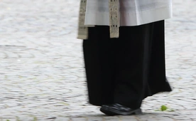 Ksiądz...