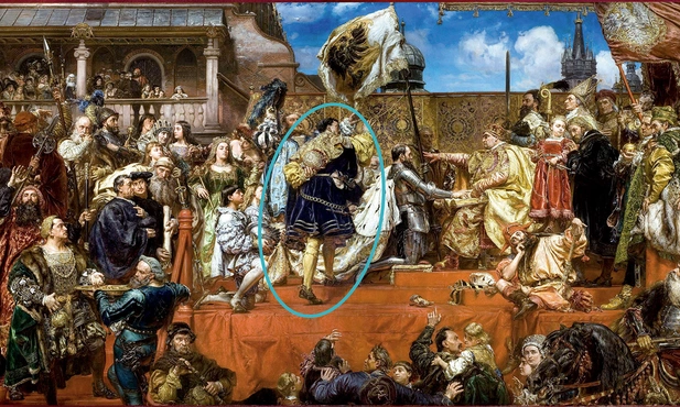 Książę Fryderyk II legnicki (zaznaczony) stoi za składającym hołd lenny Zygmuntowi Staremu Albrehtem Hochenzollernem. Podnosi w górę prawą rękę w geście poświadczenia i obietnicy, że będzie pilnował wypełniania postanowień układu