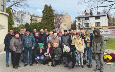 Przy grobie bł. Jerzego Popiełuszki na Żoliborzu.