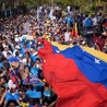 Z wenezuelską flagą